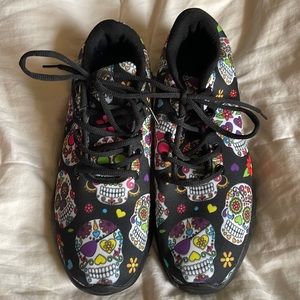 Size 12 women’s lace up sneaker. Sugar skull print. Like new, never worn.